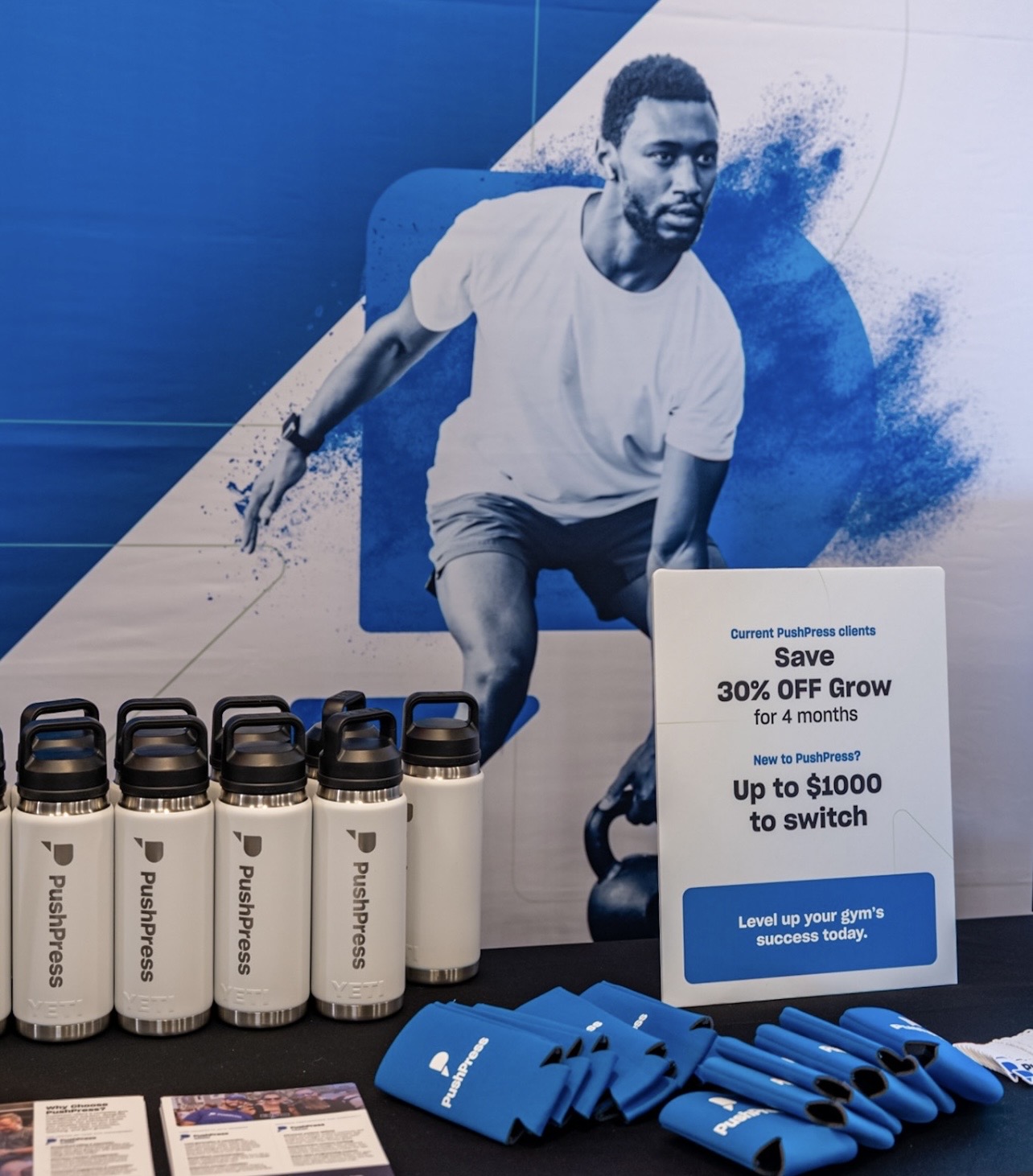 PushPress event booth with swag